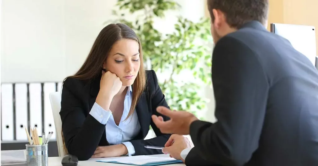 Salesman trying to convince to a bored client